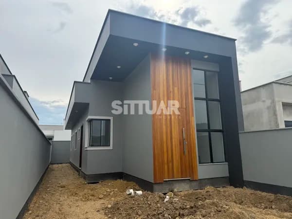 casa com 2 dormitórios e 1 suite no Tubarão/Sc