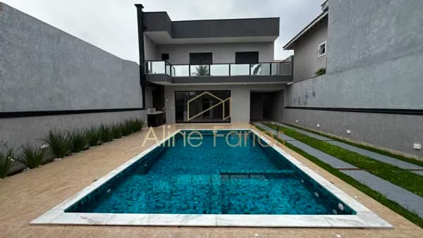 Sobrado moderno com piscina e 4 dormitórios à venda em Peruíbe