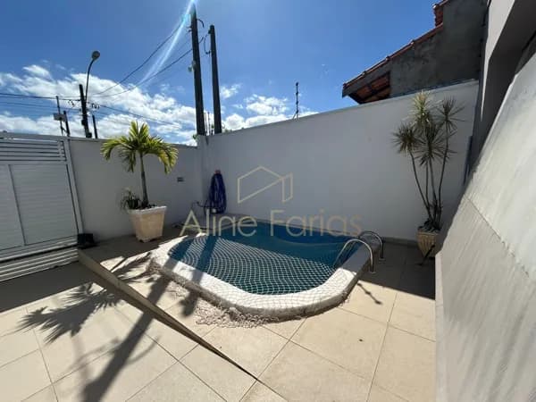 Casa aconchegante com piscina e área gourmet à venda em Peruíbe