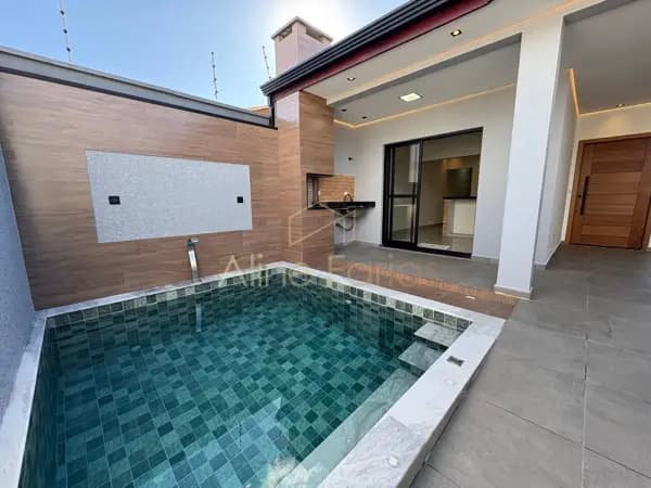Casa moderna com suíte, piscina e espaço gourmet em acabamento de alto padrão à venda em Peruíbe