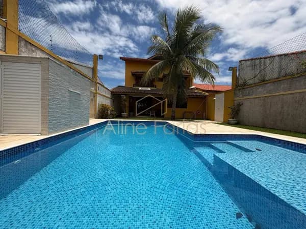 Triplex de alto padrão com piscina, área gourmet e 3 suítes à venda em Peruíbe