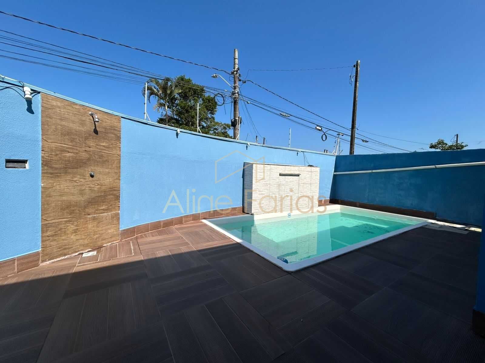 Casa de esquina com 3 dormitórios, piscina e área gourmet à venda em Peruíbe