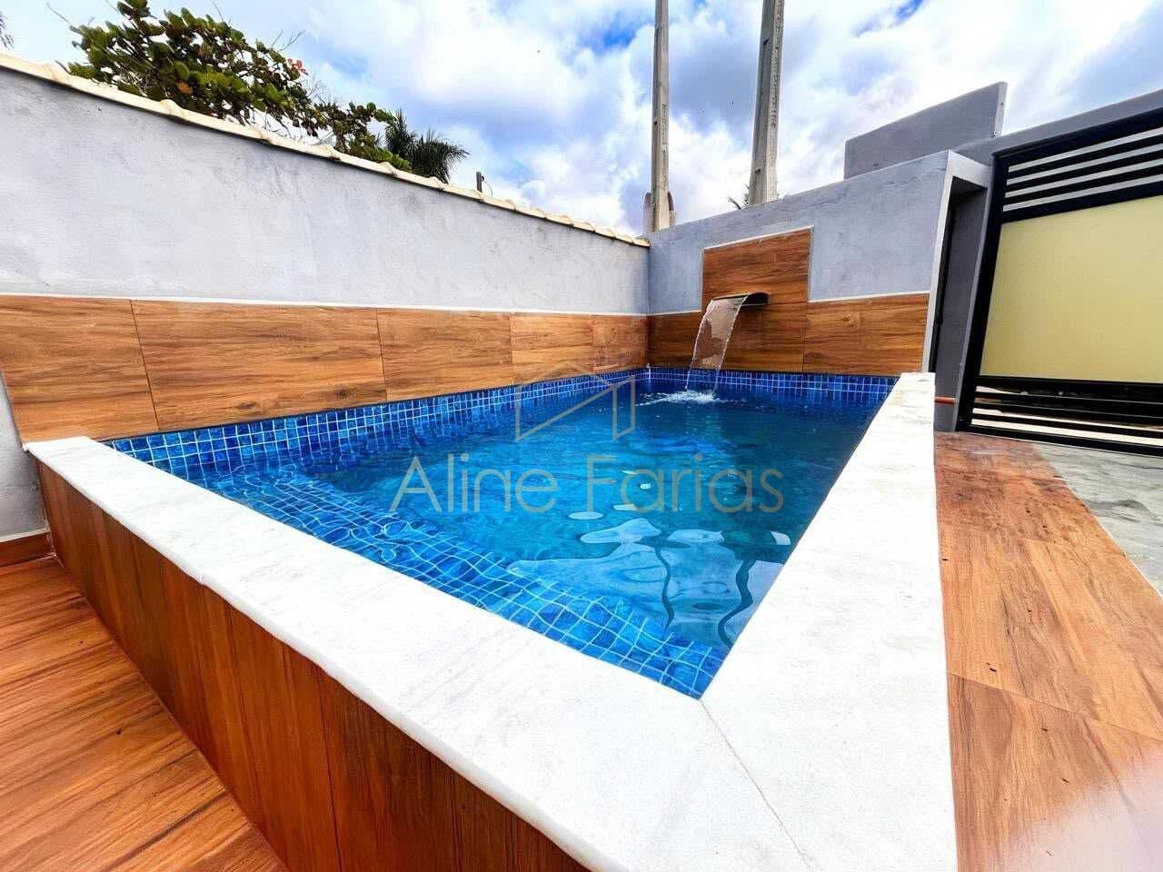 Casa aconchegante com área de lazer completa e excelente localização no litoral à venda em Itanhaém