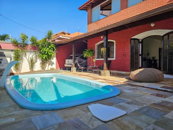 Casa com 4 dormitórios, edícula, piscina e vista para o mar à venda em Peruíbe