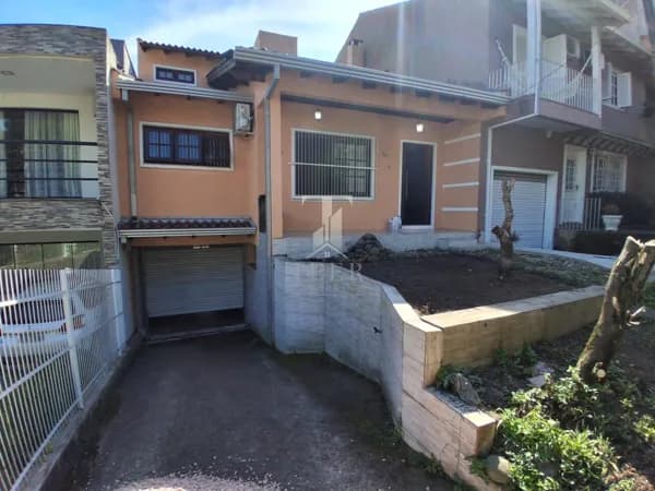 Casa Padrão em condomínio 3 dormitórios suíte lareira churrasqueira