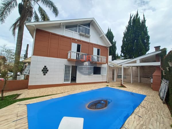 SOBRADO em condomínio com 4 suítes sendo uma suíte no térreo 4 vagas COM PISCINA PRIVATIVA a venda no são braz