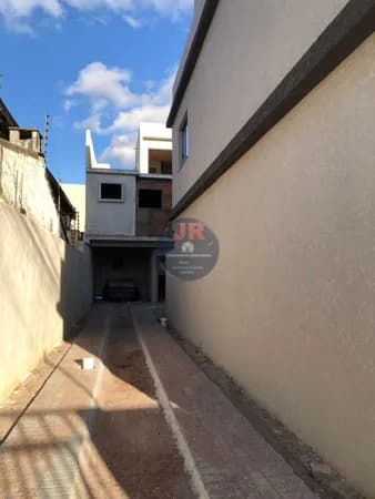 corredor privativo, terraço com escritório e banheiro sobrado a venda no novo mundo
