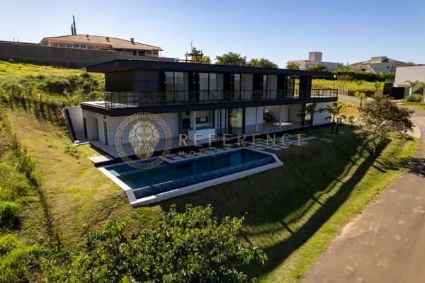 CASA NO CONDOMÍNIO FAZENDA SERRA AZUL | 504,73 M² CONSTRUÍDOS | 4 SUÍTES | PISCINA - JUNDIAÍ/SP