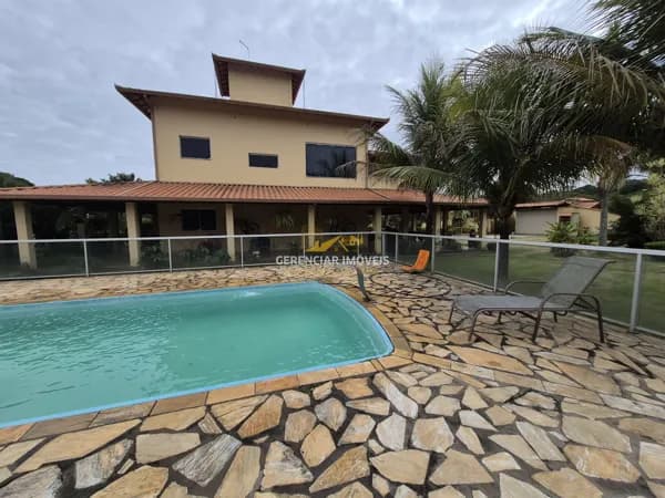 Chácara 2.410m² com piscina, suíte master, área gourmet e poço de peixes em Esmeraldas-MG