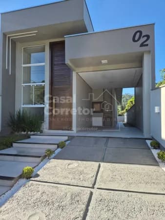 ENCANTADORA CASA DE 3 DORMITÓRIOS SENDO 1 SUÍTE