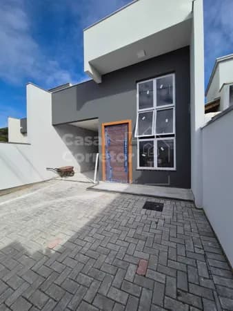 ENCANTADORA CASA DE 3 DORMITÓRIOS SENDO 1 SUÍTE