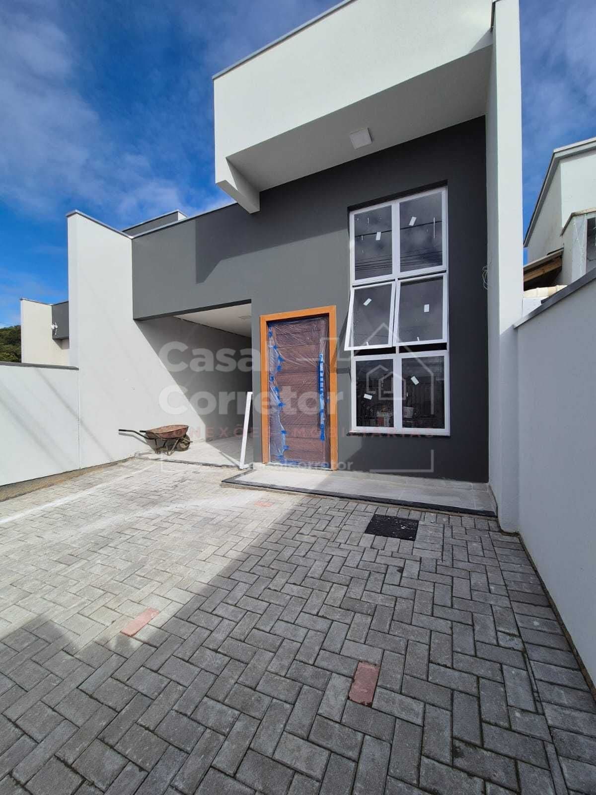 ENCANTADORA CASA DE 3 DORMITÓRIOS SENDO 1 SUÍTE