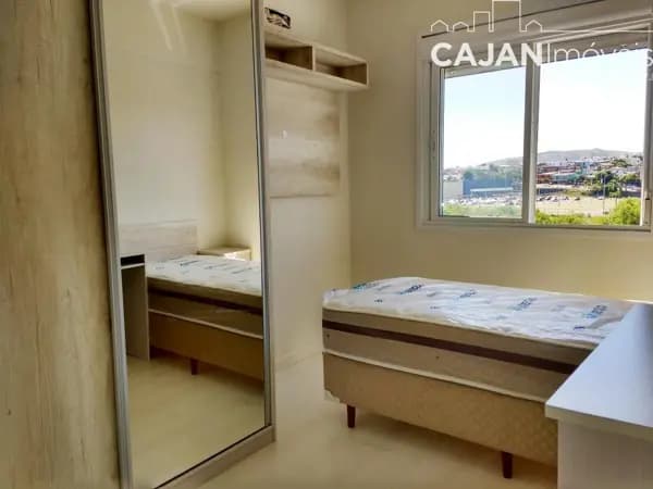 Apartamento de 2 dormitórios com terraço e 2 vagas de garagem no bairro Cavalhada