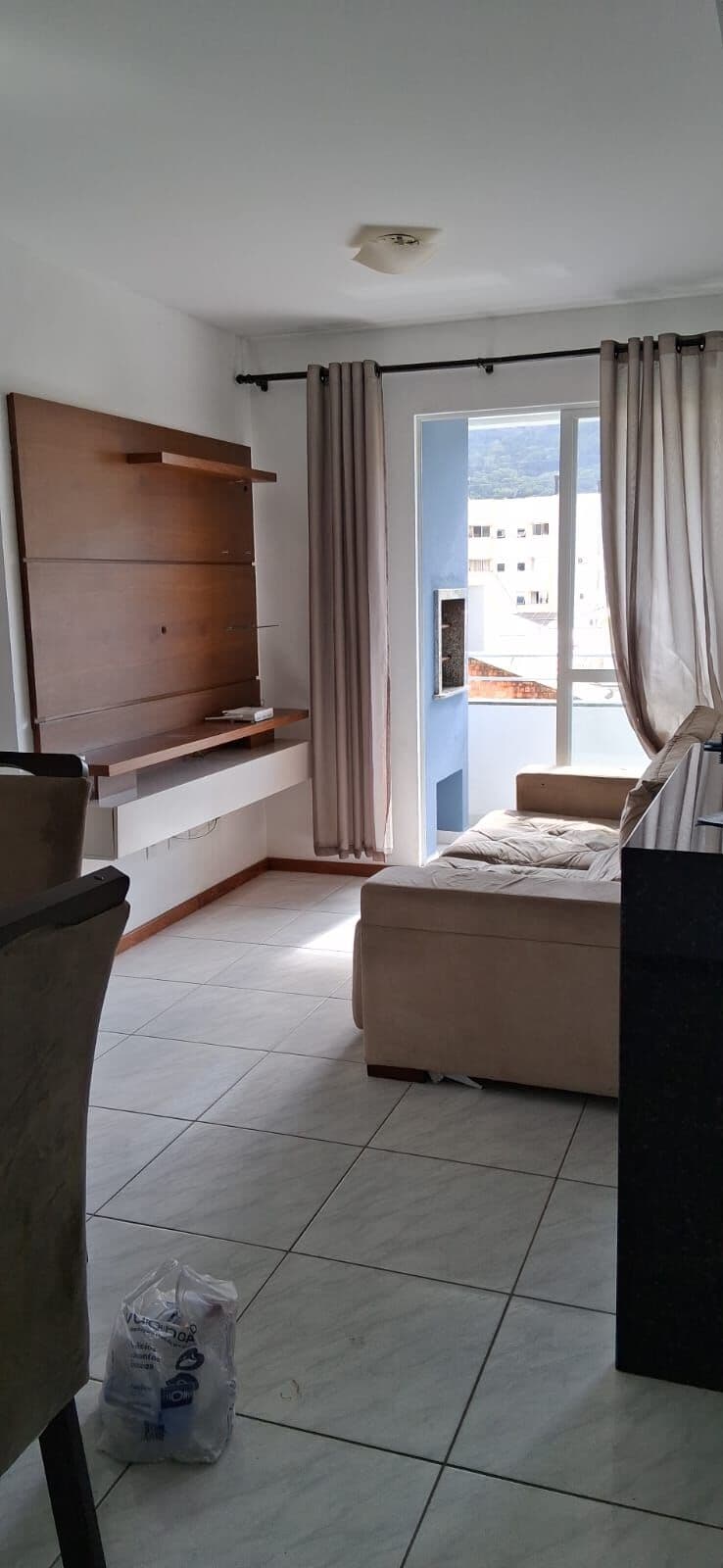 Apartamento 2 dormitórios sacada com churrasqueira