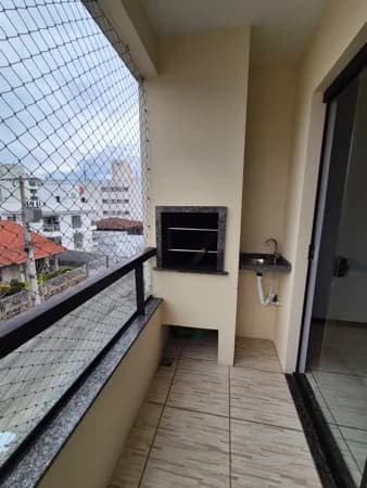 Apartamento2 dormitórios com suíte próximo shopping via Catarina