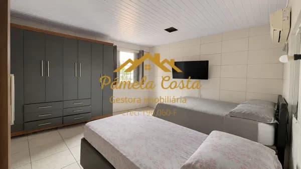 🏡 OPORTUNIDADE! CASA SOBREPOSTA BAIXA COM GARAGEM NO JARDIM DOS PÁSSAROS – GUARUJÁ/SP