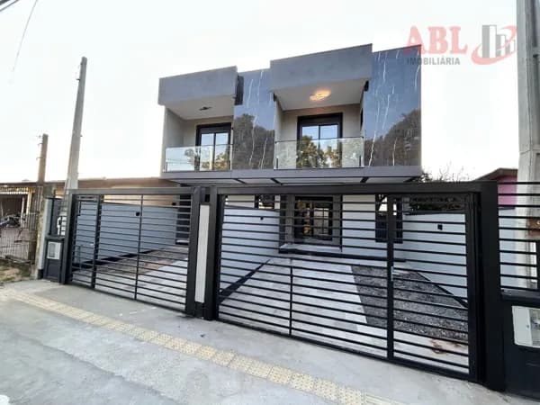 Sobrado Casa com Lareira e Churrasquira à venda no bairro Castelo Branco - Gravataí/RS