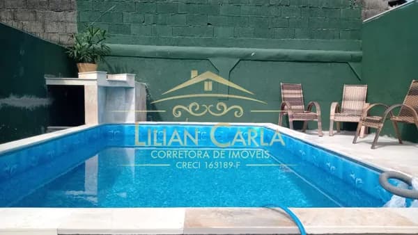 Casa à venda em Mongaguá com 2 dorm, 1 suíte e PISCINA por R$ 280 mil