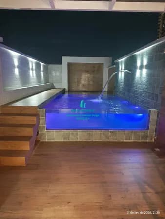 Casa Sobreposta 3 DORMITÓRIOS, 2 SUÍTES, 2 VAGAS, PISCINA COM CASCATA em Aparecida, Santos/SP