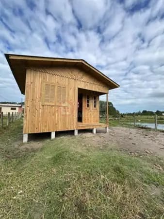 Casa com 2 Dormitórios e Terreno de 300m² à Venda no Bairro Golfinhos – Arroio do Silva/SC