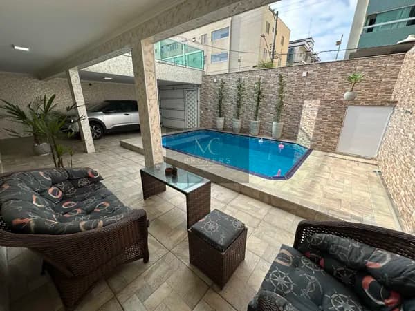 Casa com piscina 4 dormitórios edícula com churrasqueira