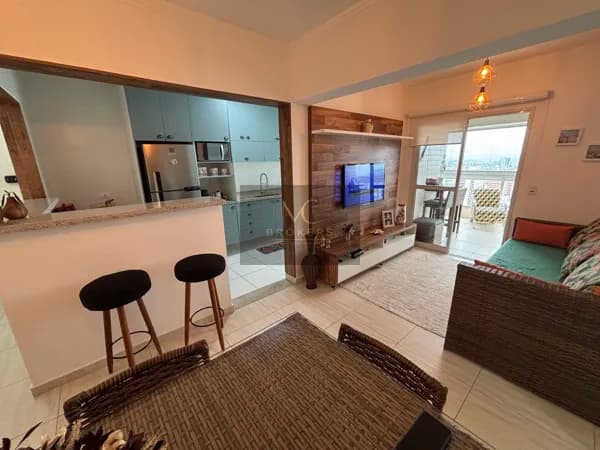 Apartamento vista mar 2 dormitórios 1 suíte e 1 vaga de garagem no bairro Tupi
