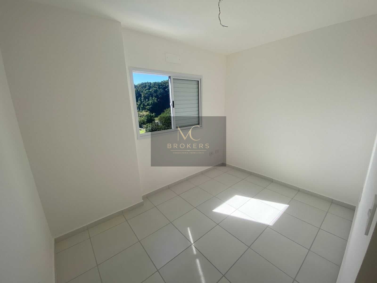Apartamento à venda no bairro Boqueirão em Praia Grande, SP. 2 dormitórios sendo 1 suíte.