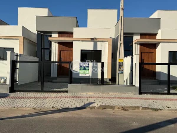CASA EM LOTEAMENTO COM DOIS DORMITÓRIOS