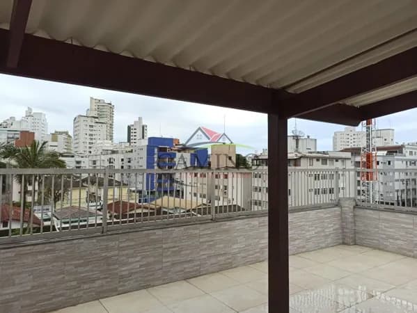 Apartamento à venda com 1 dormitório, 57 m², próximo à praia das Astúrias, Guarujá/SP.