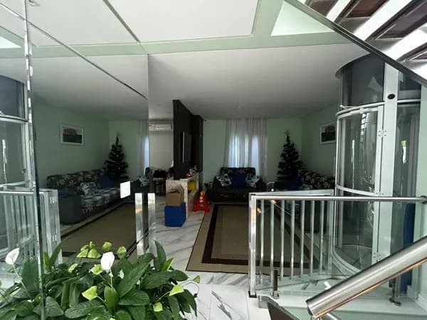 Sobrado com 3 dormitórios à venda, 220 m² por R$ 3.500.000,00 - Condomínio Aruã Brisas - Mogi das Cruzes/SP