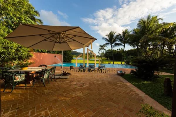 Casa com 4 dormitórios à venda, 576 m² por R$ 4.500.000,00 - Balneário Praia do Pernambuco - Guarujá/SP