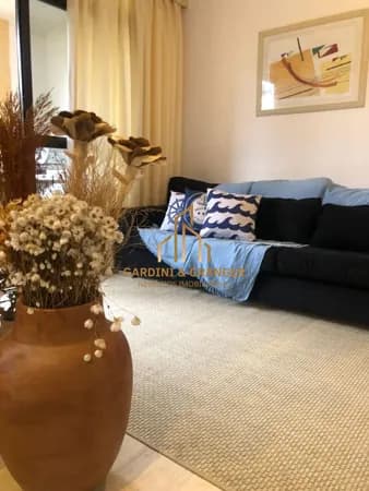 Flat com 2 dormitórios à venda, 60 m² - Riviera de São Lourenço - Bertioga/SP