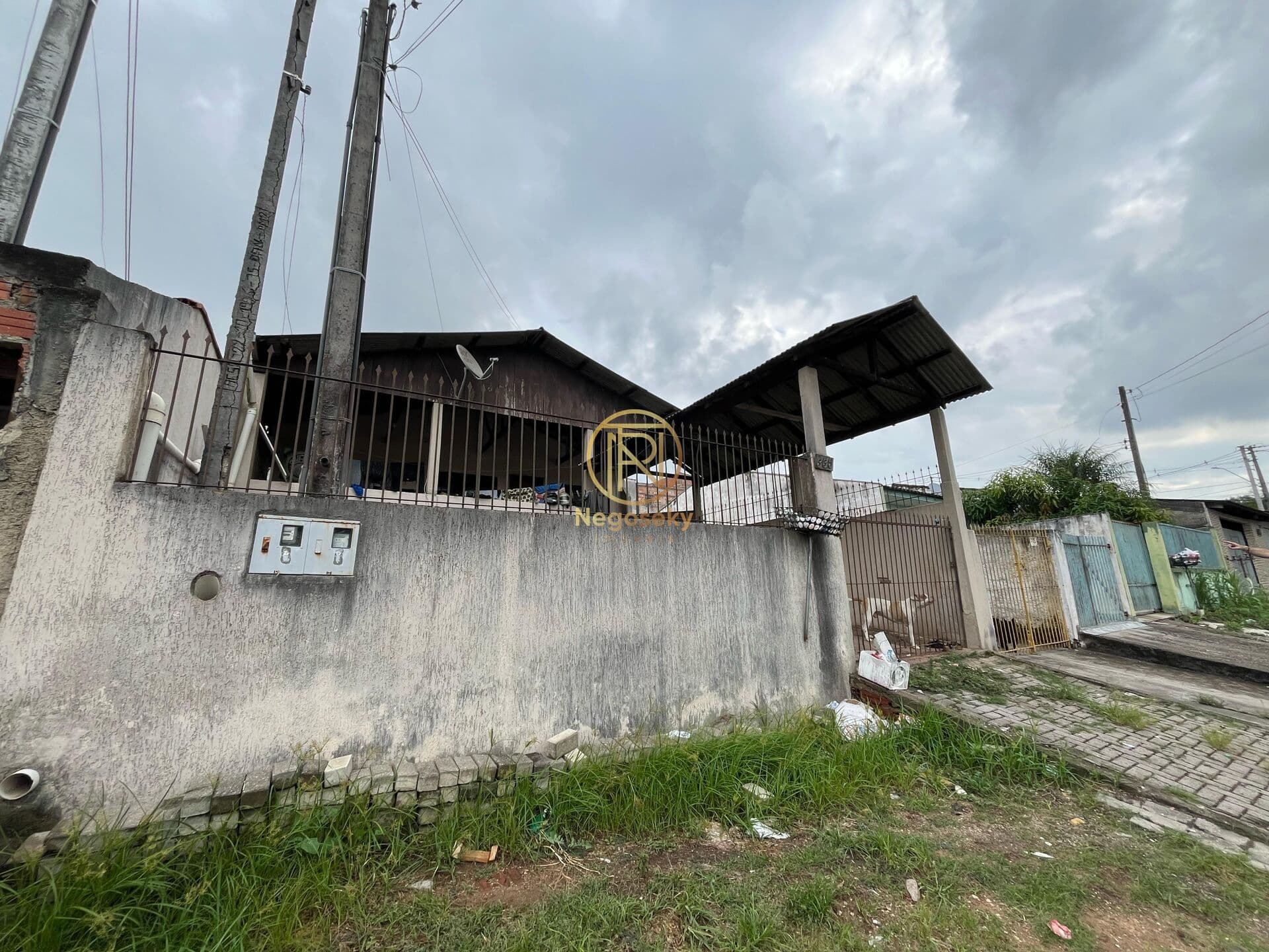 Terreno com 2 casas no Quissisana