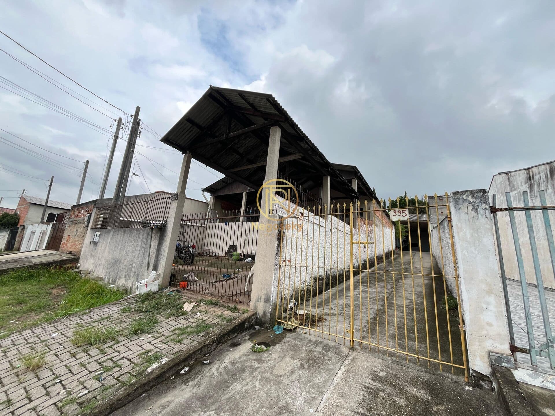 Terreno com 2 casas no Quissisana