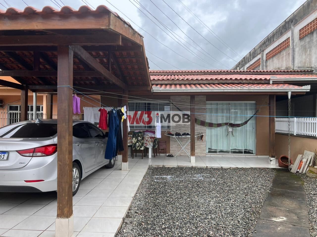 Terreno com 04 casas