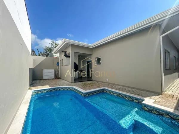 Casa com 3 suítes, arquitetura moderna e ambientes integrados à venda em Peruíbe