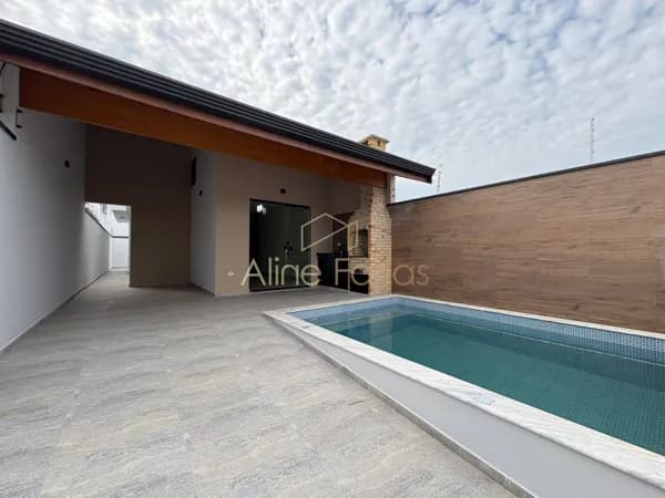 Casa nova no Flora Rica II com piscina e ambientes planejados à venda em Peruíbe