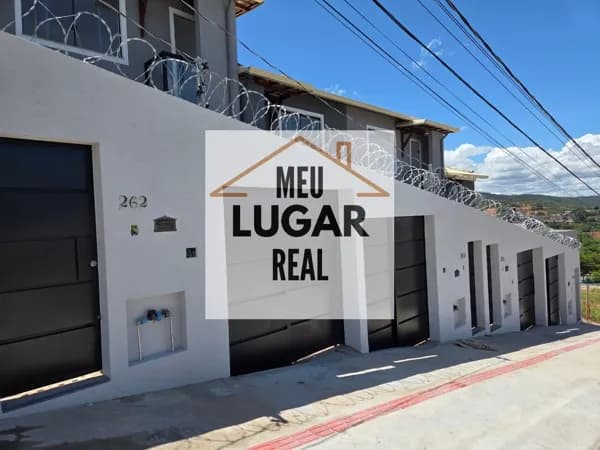 Casa Geminada - Sta. Luzia - 2 quartos, 1vg, sacada e área de serviço coberta