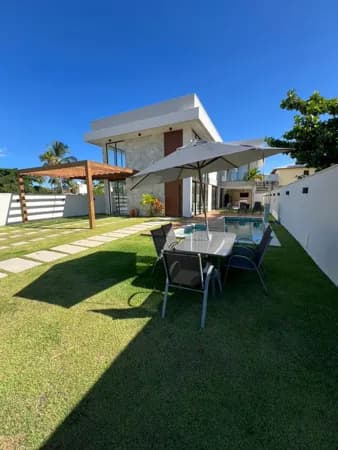 Casa 7 suítes à venda em Guarajuba, 422m², porteira fechada, piscina e área gourmet – Condomínio Canto do Mar Previllege