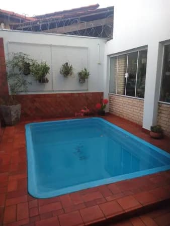Casa com 5 quartos à venda no Bairro Cidade Jardim - Uberlândia/MG