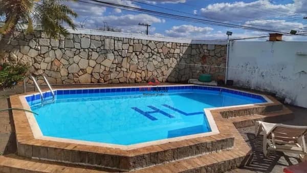 Casa com 4 quartos à venda, bairro Brasil - Uberlândia/MG
