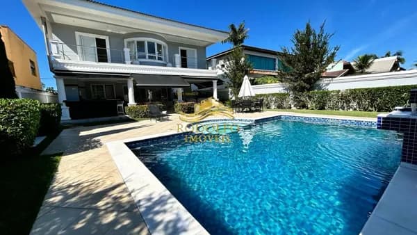 Guarujá-SP Casa no Condomínio Acapulco 4 Suítes 420m² 4 Vagas Piscina Varanda Gourmet Hidromassagem