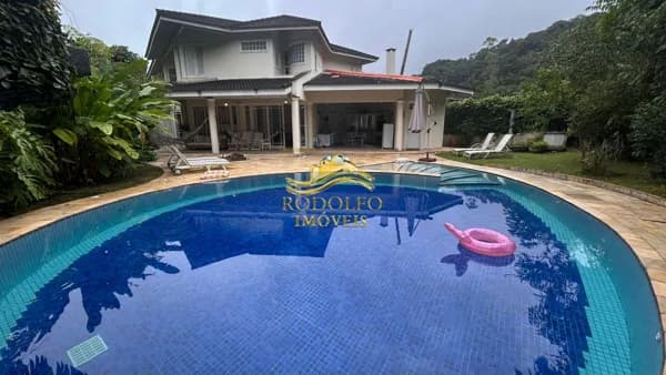 Guarujá-SP Praia da Enseada Casa em Condomínio de Luxo 5 Suítes 500m² Piscina Varanda Gourmet Jardim Ar-condicionado Hidromassagem