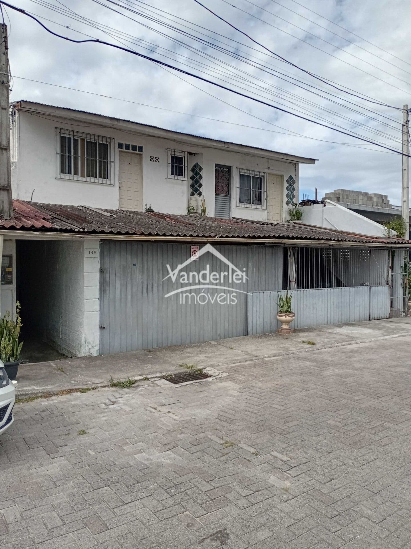 Casa térrea com 10 kitnet no bairro Barra do Aririú, Palhoça/SC