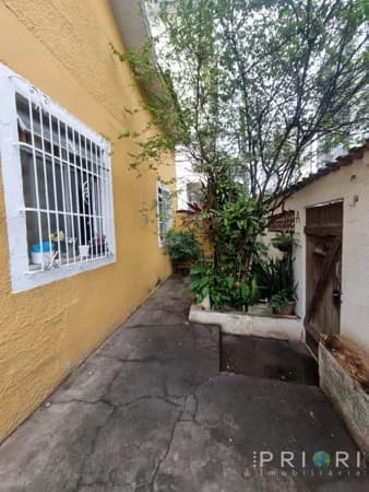 Ampla casa com duas residências e área de lazer completa em Todos os Santos
