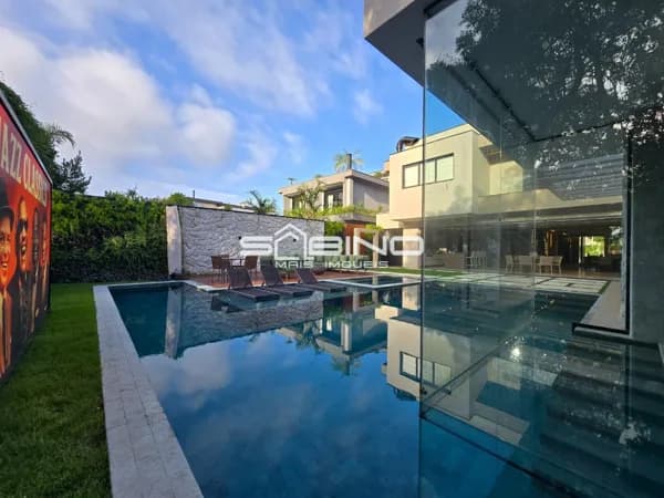 Imobiliária na Riviera de São Lourenço, Casa à venda no Módulo 11, com 6 suítes, 661,37m² de área útil, 6 vagas