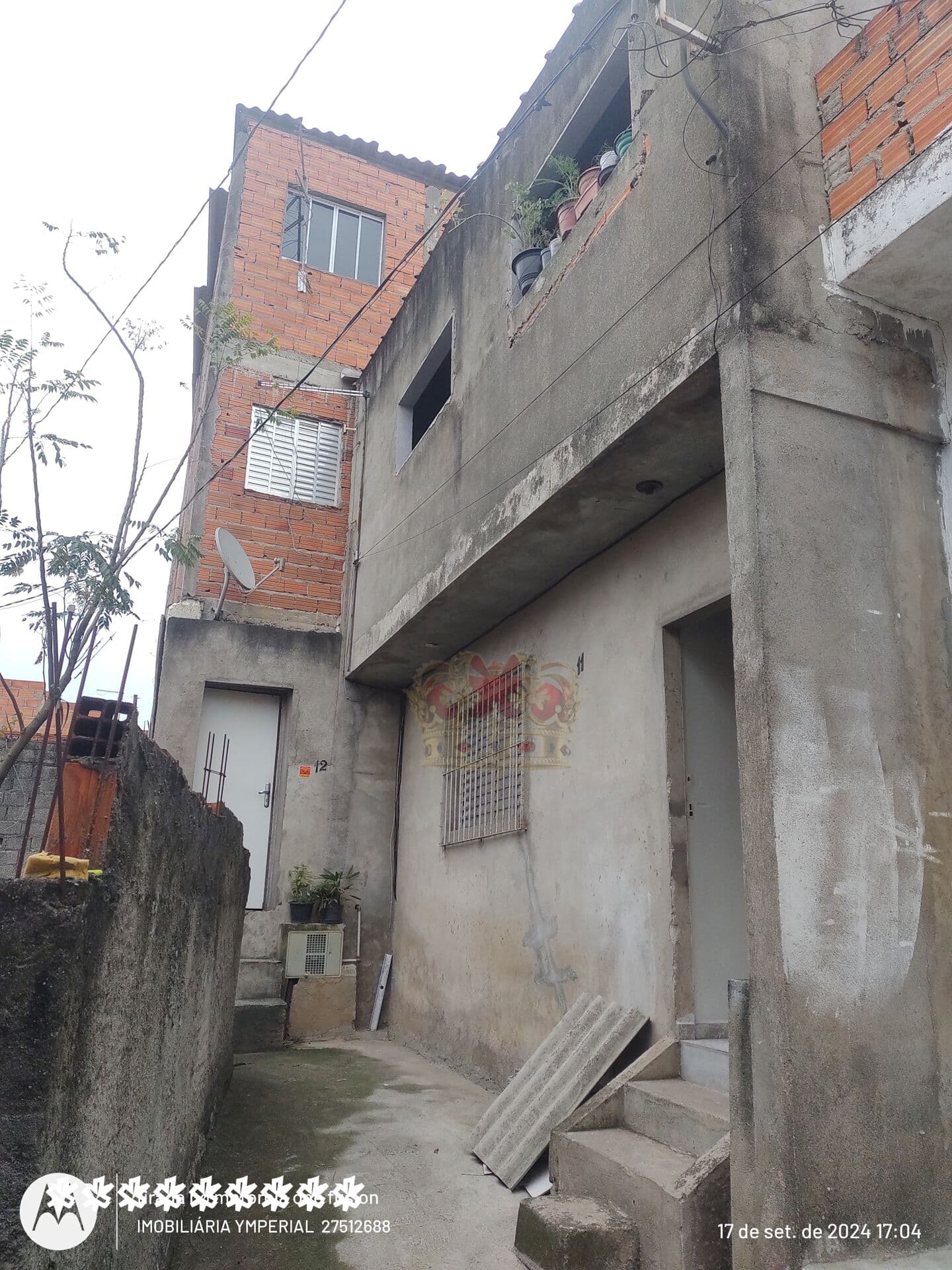 Sobrado com 3 quartos, cozinha , 2 w.c e uma area para ter bons momentos de confraternização