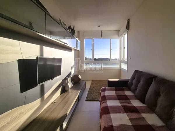 Apartamento semi-mobiliado de 2 dormitórios
