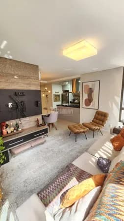 Apartamento mobiliado de 2 dormitórios com suíte e 2 vagas