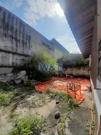 Casa com piscina terreno grande